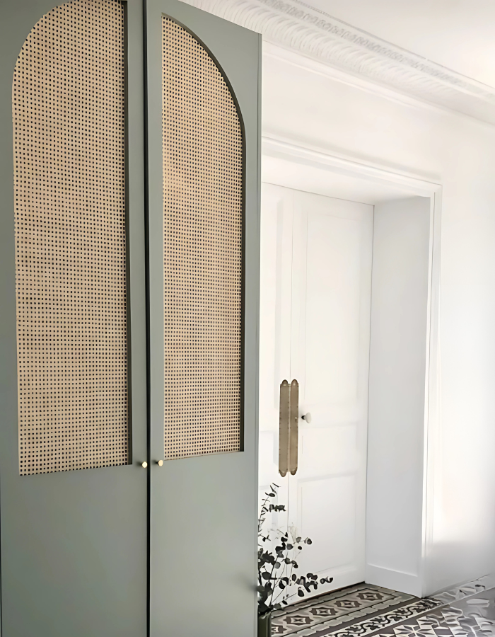 Designer wardrobe with cane panel doors for luxury interiors in Bangalore